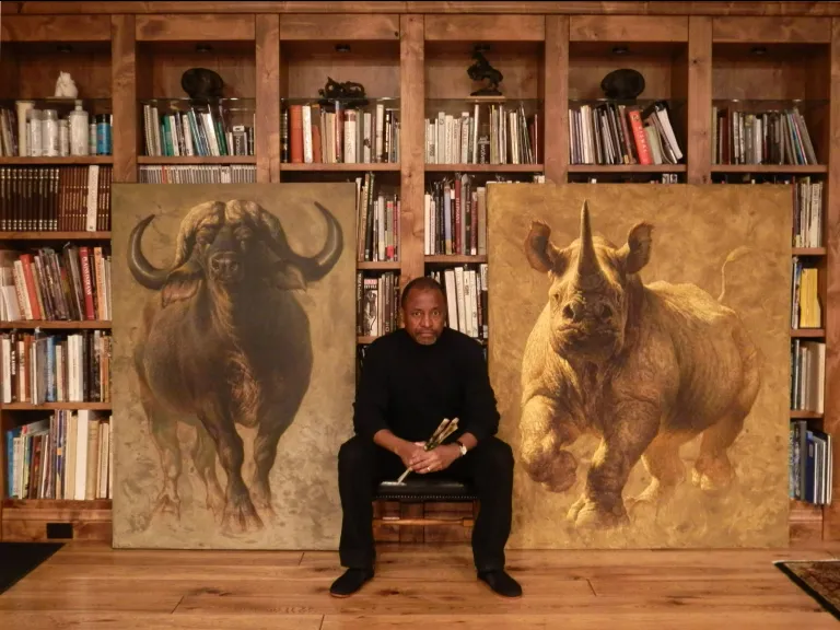 Ezra Tucker with Paintings