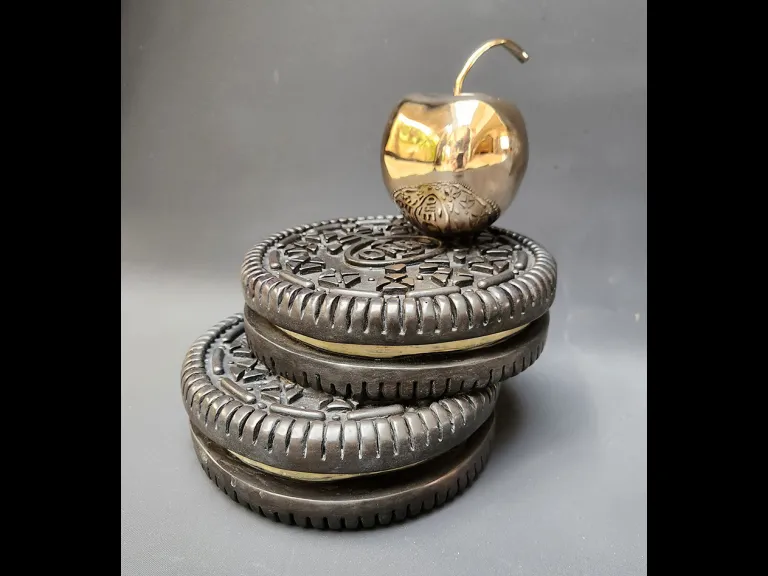 Size Matters - Maidy Morhous - Whimsical bronze sculpture of cookies and an apple